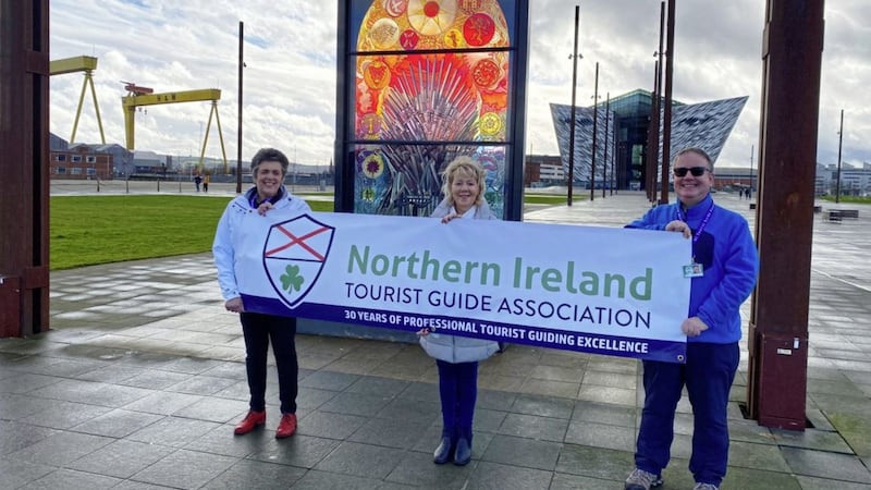 The Northern Ireland Tourist Guide Association is celebrating its 30th anniversary this year and will be running a number of free tours this weekend. Pictured are NITGA secretary Sue McKay, Chairperson Catherine Burns and Green Badge Guide Ian Baillie in the popular Titanic Quarter 