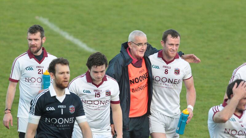 Slaughtneil manager Mickey Moran with players after their win over Derrygonnelly during the Ulster Club Senior Football Championship preliminary round at Owenbeg on Sunday. Included are Patsy Bradley 8, Fergal McEldowney 21, Antoin McMullan 1 and Cormac O'Doherty 15. Picture Margaret McLaughlin.&nbsp;