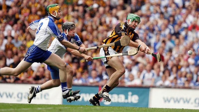 Kilkenny hurling legend Eddie Brennan scores despite pressure from Waterford's Aiden Kearney and Noel Connors during an All-Ireland Hurling Championship clash. Picture by Seamus Loughran