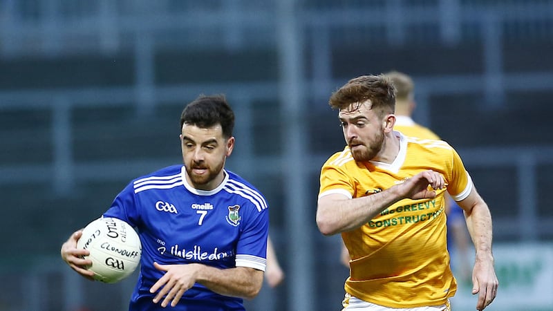 Warrenpoint's rampaging wing-back Ryan Magee (left), who scored the final spot-kick in the penalty shoot-out victory over Clonduff after the sides drew 0-20 to 3-11 after extra time in the Down SFC.<br />Pic: Philip Walsh<br />&nbsp;