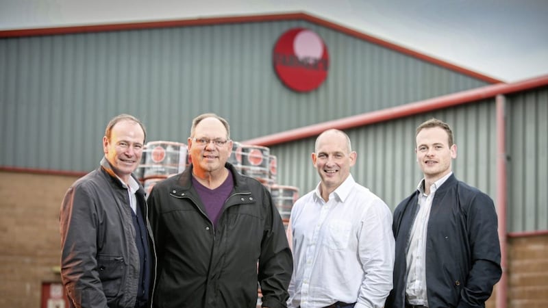 US customer, David Liefer (second left) from Synthetic Resources, Kansas is pictured during a recent visit to UPU headquarters in Dromore Also pictured are: Phillip Orr, Gary McDonald and Harry Orr from UPU. 