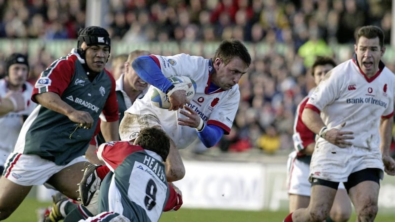 Ulster&#39;s Neil Best is tackled by Leicester&#39;s Austin Healey before passing the ball to Ulster&#39;s Andy Ward (right) who scored the team&#39;s second try during their Heineken Cup Pool One match at Ravenhill Park Belfast Sunday January 11 2004. Picture by PA / Paul Faith 