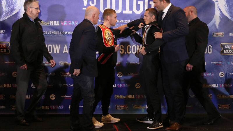 Carl Frampton and Scott Quigg are restrained by promoters Barry McGuigan and Eddie Hearn after a press conference at the Radisson Blu Hotel in Manchester on Thursday<br />Picture by PA&nbsp;