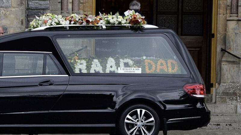 There were no paramilitary trappings at the funeral but the hearse contained a floral tribute spelling out &quot;RAAD&quot;. Picture by Pacemaker Press 