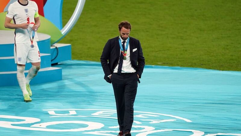 &nbsp;England manager Gareth Southgate and Harry Kane (left) are dejected following the UEFA Euro 2020 Final at Wembley Stadium, London. Picture date: Sunday July 11, 2021.