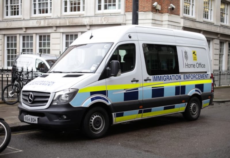 A Home Office immigration enforcement van parked in Westminster