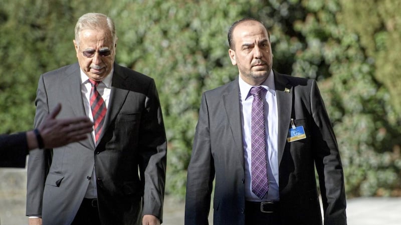 TALKS: Syria&rsquo;s main opposition leader Nasr al-Hariri, right, arrives for a round of negotiations              PictureS: Martial Trezzini/Keystone via AP 