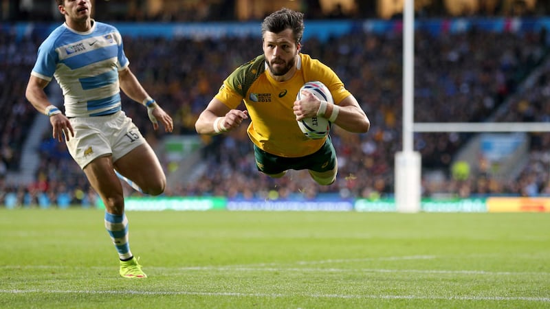 WOULD YOU ADAM AND EVE IT? Adam Ashley-Cooper touches &nbsp;down for one of his three tries in Australia&rsquo;s win over Argentina yesterday