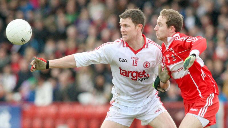 Former Tyrone midfielder Enda McGinley (left) believes uncertainty over Mickey Harte's position could lead to speculation about his future next season