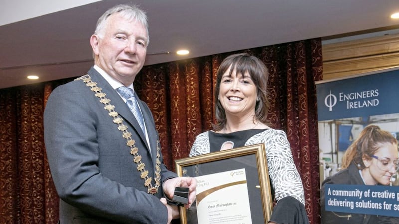 Emer Murnaghan receives her award from Peter Quinn, former president of Engineers Ireland 