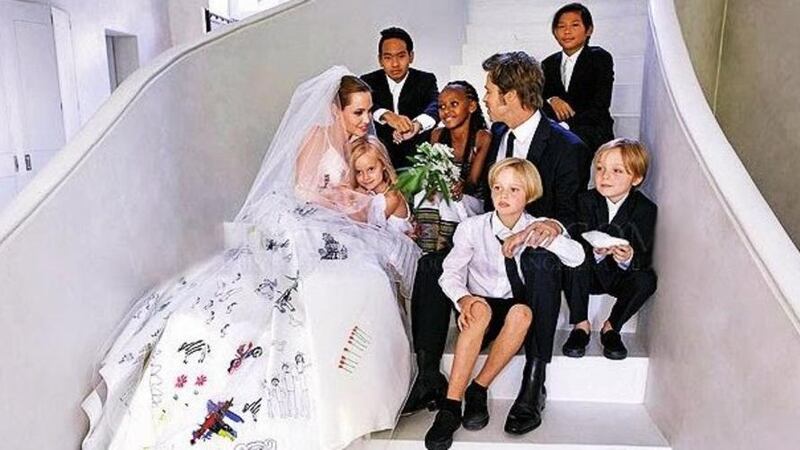 Brad Pitt and Angelina Jolie on their wedding day at around the time a psychic announced they had separated