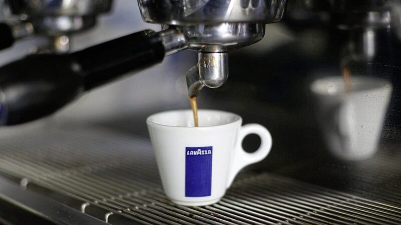 Italian coffee giant Lavazza has warned of a double-digit drop in earnings this year amid surging coffee bean costs 