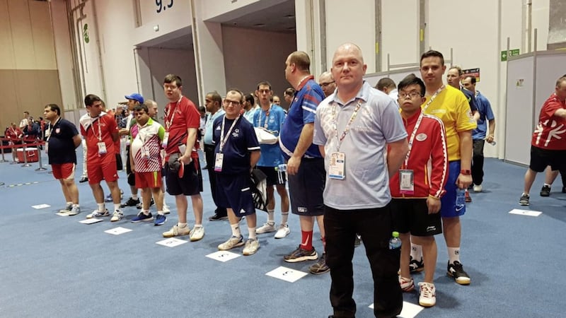 Brendan McNeice pictured with Special Olympic athletes from around the world at the 2019 World Games in Abu Dhabi 