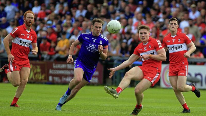 Ethan Doherty being pursued by Niall Kearns Picture  Seamus Loughran.