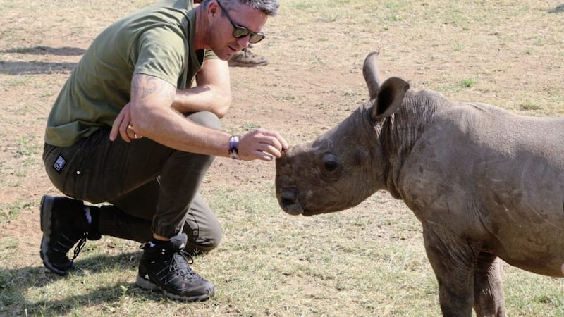 Kevin Pietersen and friend in a scene Save This Rhino 