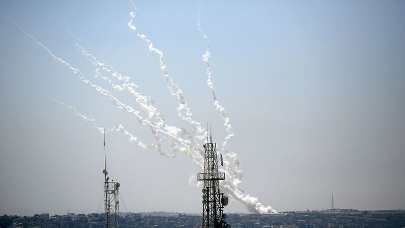 Rockets are launched from Gaza Strip to Israel, Thursday, May 13, 2021. Israeli airstrikes killed multiple senior Hamas military figures Wednesday and toppled a pair of high-rise towers housing Hamas facilities (AP Photo/Hatem Moussa)&nbsp;