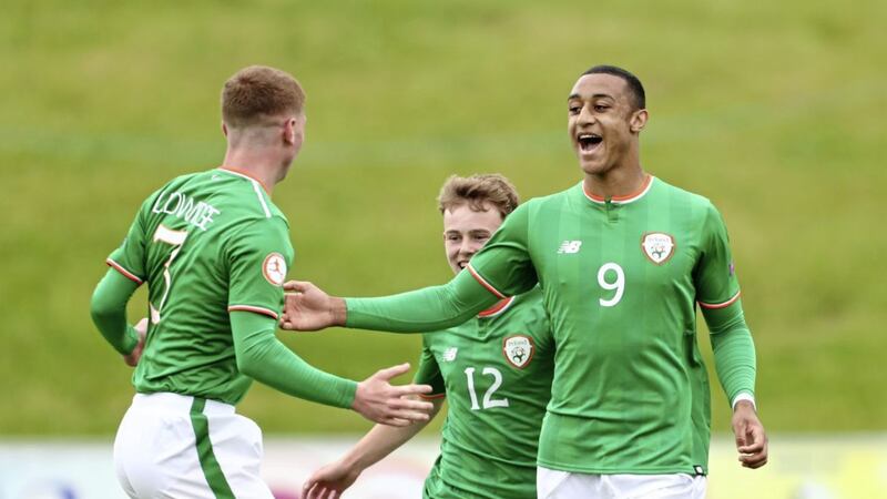 Republic of Ireland teams at all levels today are reflecting stories of families who have moved to make Ireland their home, including Adam Idah (pictured right) with teammates Marc Walsh (centre) and Kameron Ledwidge. 