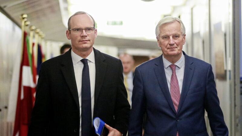 EU chief Brexit negotiator Michel Barnier, right, walks with T&aacute;naiste Simon Coveney prior to a meeting at EU headquarters in Brussels exactly a year ago. Mr Coveney is back in the Belgian capital to attend a meeting of the EU foreign affairs council where discussions on Moldova, China and Yemen are on the agenda 