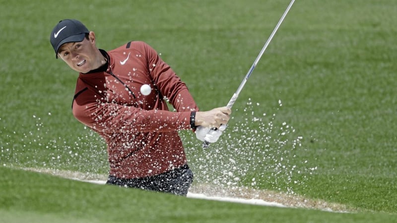 Rory McIlroy hits from a bunker on the second hole at the Masters in Augusta