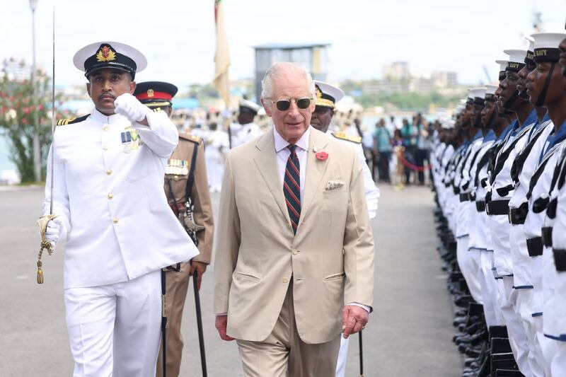 The King, as Captain General of the Royal Marines, views the guard of honour as he and Queen Camilla receive a ceremonial welcome during a visit to Mtongwe Naval Base in Mombasa