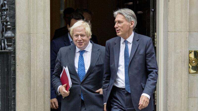 Britain&#39;s foreign secretary Boris Johnson, left, and Chancellor Philip Hammond. Picture by Dominic Lipinski, Press Association 