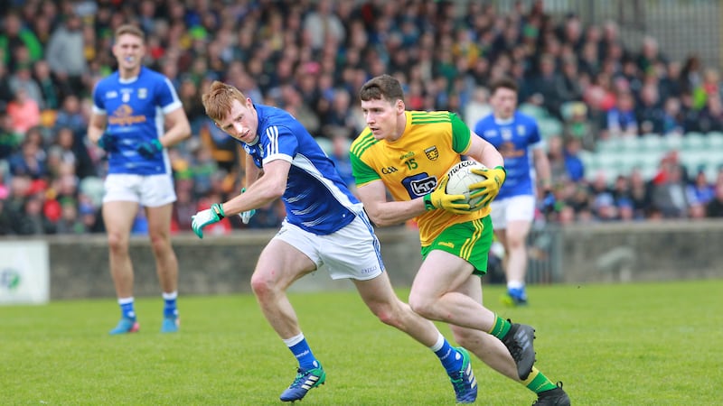 Donegal's Jamie Brennan with Jason McLoughlin of Cavan during the Ulster Senior Football Championship preliminary round match at Ballybofey on Sunday Picture by Margaret McLaughlin