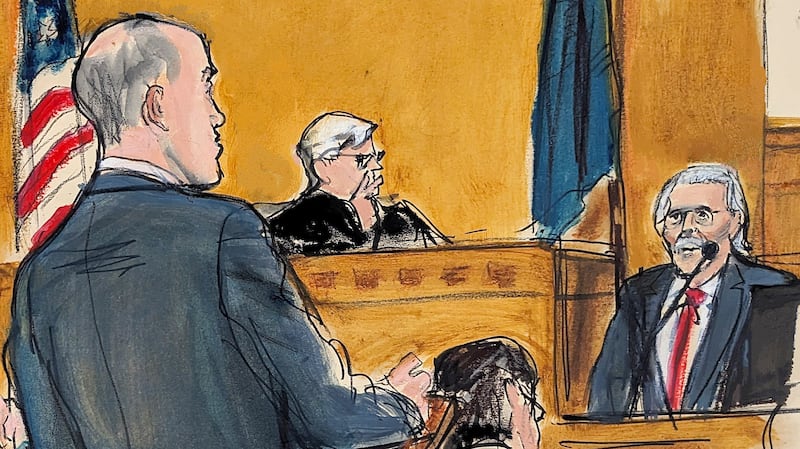 Defence lawyer Emil Bove, left, cross-examines David Pecker in the witness box with Judge Juan Merchan presiding in New York (Elizabeth Williams via AP)