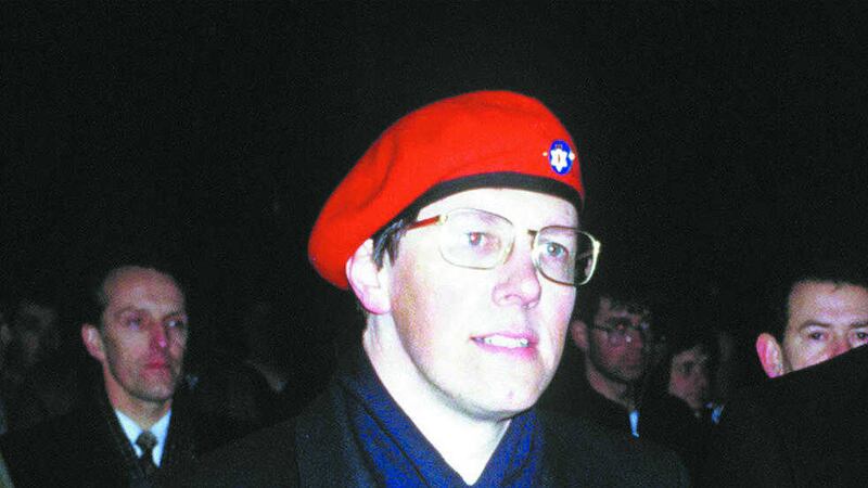 The then DUP deputy leader Peter Robinson wearing his Ulster Resistance beret. Picture by Pacemaker