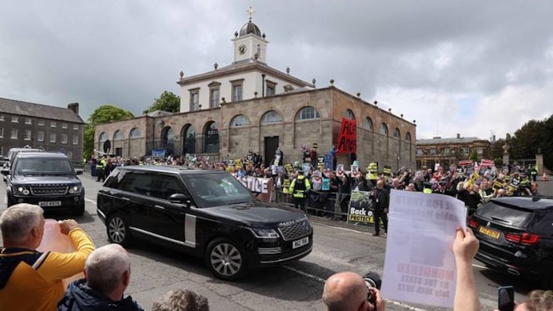 British Prime Minister Boris Johnson's cavalcade arrives at Hillsborough Castle during a visit to Northern Ireland for talks with Stormont parties. Around 20o protesters greeted him.&nbsp;Picture by Liam Burney, PA