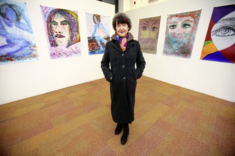 Lise McGreevy with her solo exhibition at the Engine Room Gallery. Picture by Mal McCann 