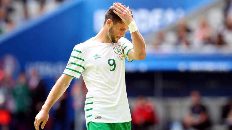 The Republic of Ireland&#39;s Shane Long appears dejected during that match against Belgium 