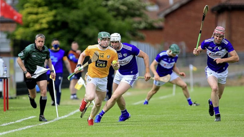 Antrim&#39;s Conal Cunning and Laois&#39;s Ryan Mullaney during a 2021 clash at Corrigan Park Picture Seamus Loughran. 