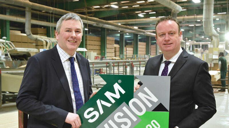 Richard Holmes, left, managing director of SAM Mouldings and Stephen Kelly, chief executive of Manufacturing Northern Ireland 