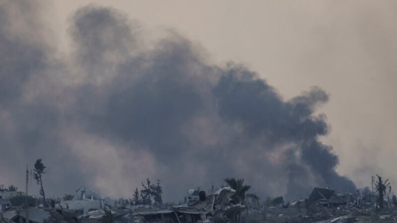 Smoke rises after an explosion in the Gaza Strip, on Thursday (Leo Correa/AP)