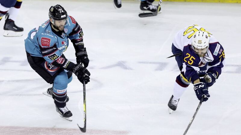 Belfast Giants&#39; Blair Riley with Guildford Flames&#39; Kevin King (right) during an Elite Ice Hockey League game at the SSE Arena, Belfast on Saturday October 10 2018. Picture by William Cherry/Presseye. 