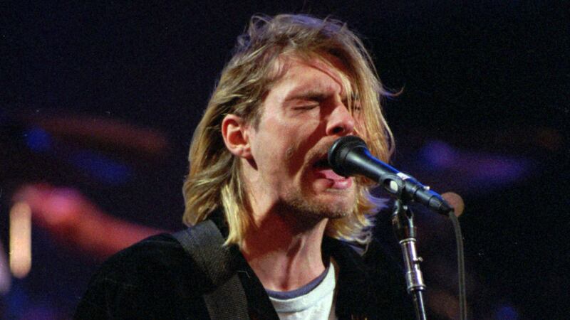 Seattle journalist Richard Lee has pursued the release of 55 pictures in an attempt to prove the Nirvana star did not die from suicide.