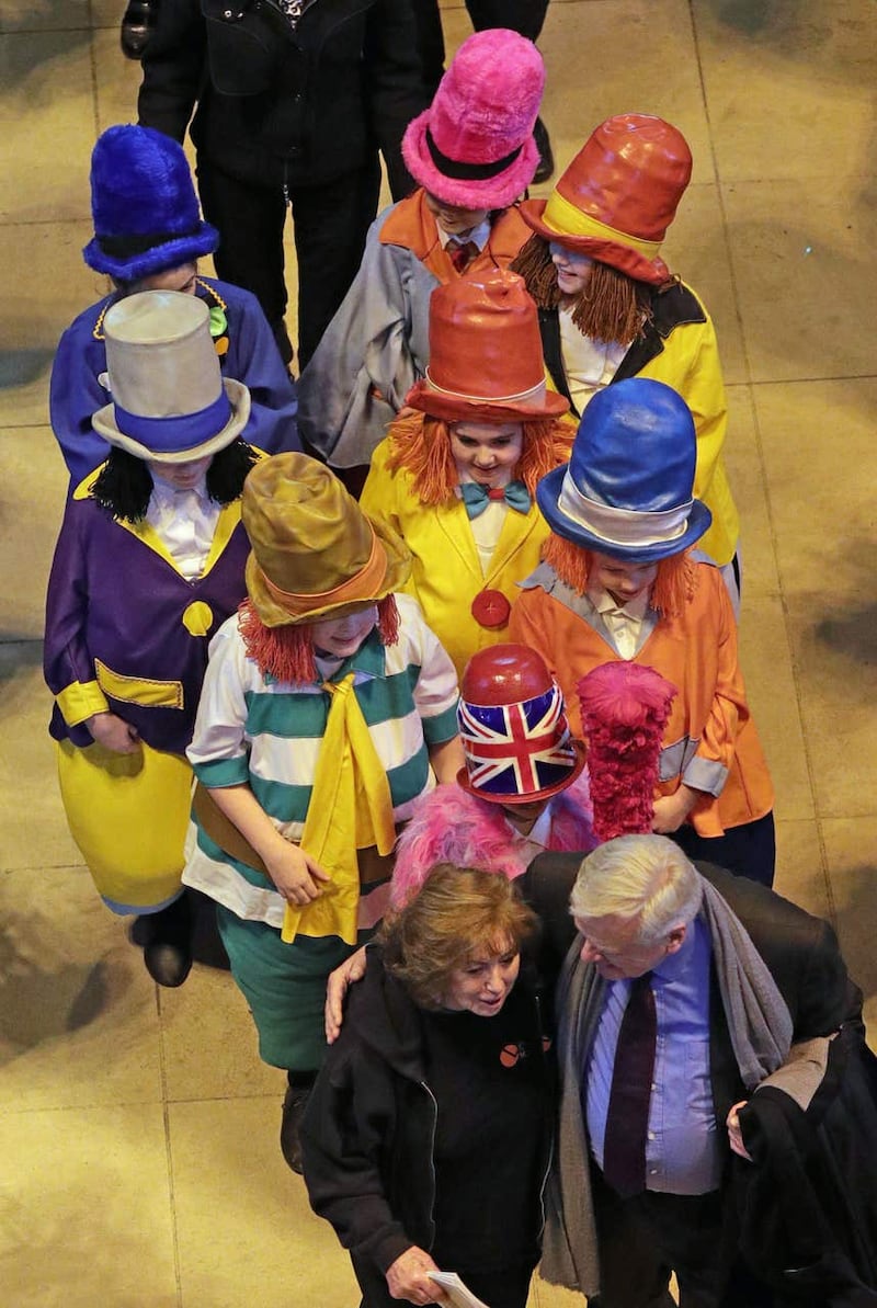 Children dressed as Diddymen follow Sir Ken Dodd’s coffin (Aaron Chown/PA)