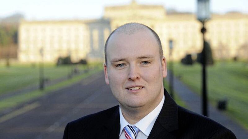 David McIlveen said the RHI was designed to &quot;curry favour with the rural electorate&quot; 