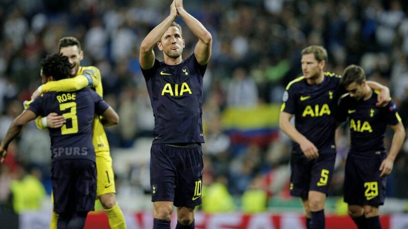 Tottenham&#39;s Harry Kane applauds the travelling fans after his side&#39;s 1-1 draw in Madrid 