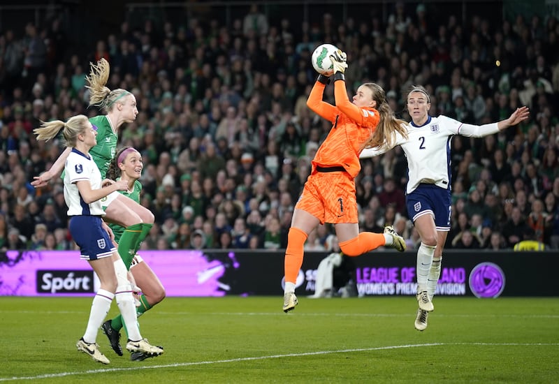 Hannah Hampton claims a high ball against the Republic of Ireland