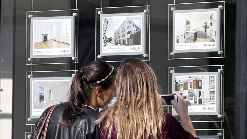 Halifax says average house prices in Northern Ireland rose by 12.5 per cent over the last year to &pound;185,505, but a separate report from Rics shows that home-buyer inquiries fell in August at the steepest rate since the early stages of the coronavirus pandemic 