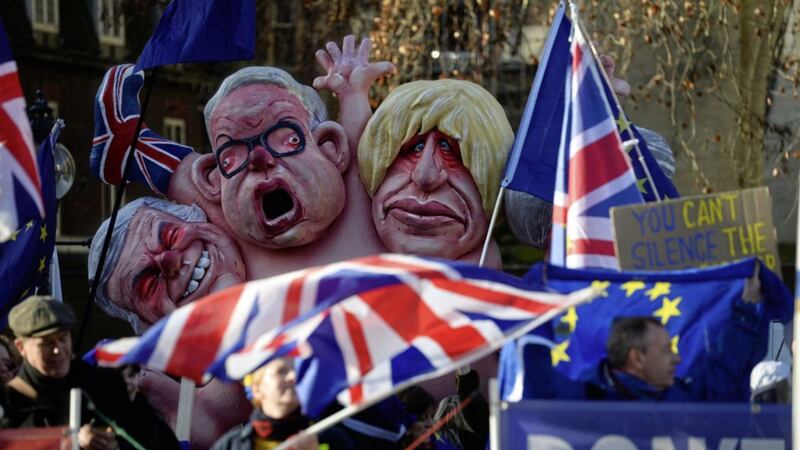 Protestors in Westminster the morning after Theresa May deferred the parliamentary vote on her Brexit deal Picture by Kirsty O&#39;Connor/PA 