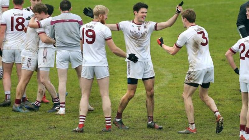 Slaughtneil's Chrissy McKaigue and Brendan Rogers celebrate after beating Magherafelt in today's Derry Senior Football Championship final at Bellaghy <br />Picture by Margaret McLaughlin&nbsp;