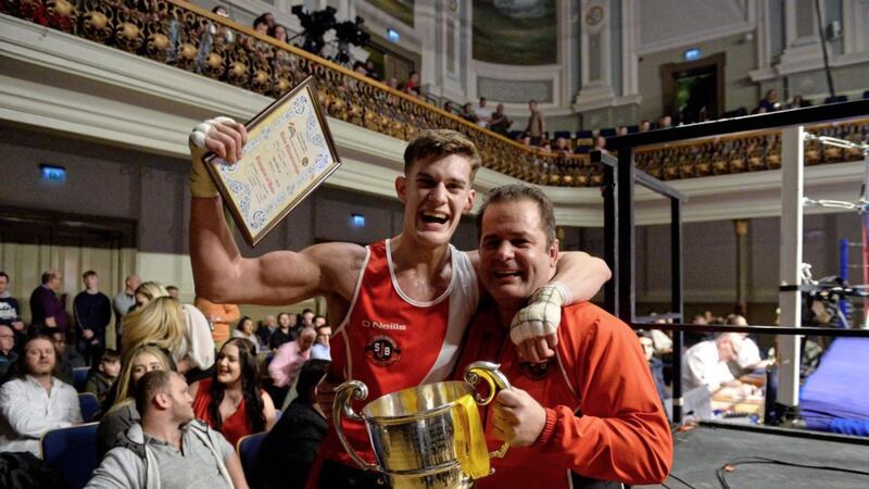 Paul McCullagh, pictured with dad Paul sr, took the Ulster Elite light-heavyweight title at the Ulster Hall back in January. Picture by Mark Marlow 