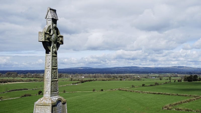 The high stone cross at the Rock of Cashel standing sentry over the Co Tipperary countryside 