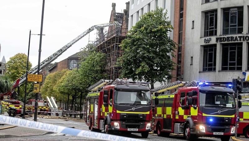 More than 50 firefighters are tackling a blaze at Belfast&#39;s Cathedral Quarter.Crews were called to the Old Cathedral Building, which is home to a range of businesses and groups, at 05:37 BST on Monday.Eight fire engines were dispatched from Belfast, alongside a command unit from Lisburn and two fire aerial appliances.Picture by Hugh Russell. 