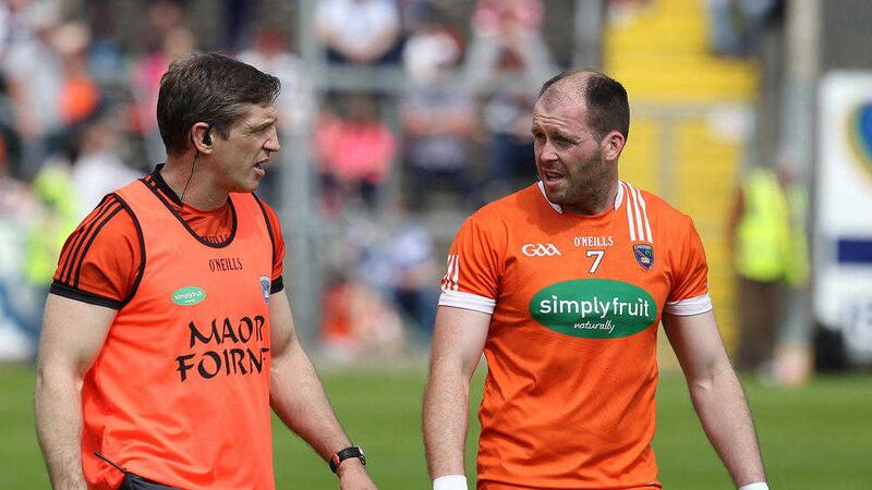 Ciaran McKeever (right) is ruled out of Armagh's Championship campaign with a broken foot<br /> Picture by Philip Walsh