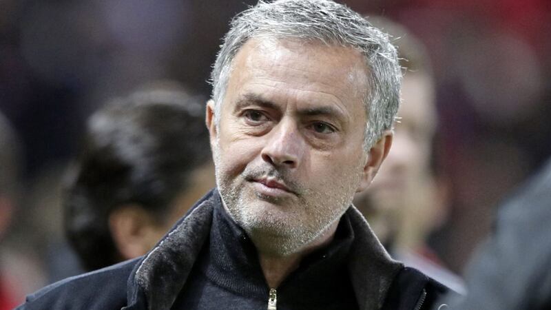Manchester United manager Jose Mourinho trudges off the Old Trafford pitch after defeat to Sevilla 