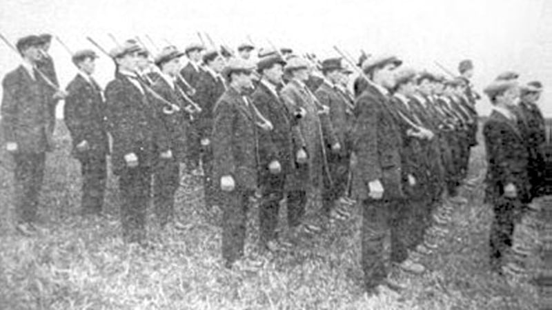 Irish Volunteers drilling with hurleys at Strabane in 1914. 
