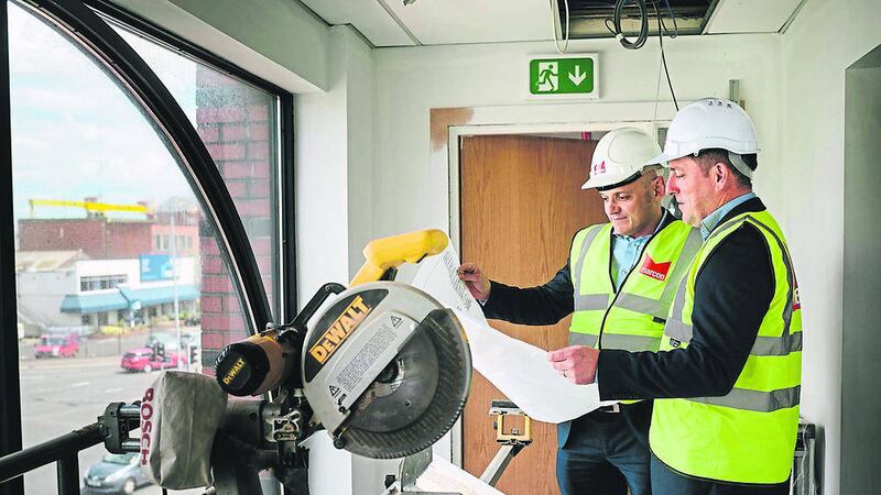 BIG PLANS: Professor Johnny Moore, left, clinical director, Cathedral Eye Clinic and Mark O&rsquo;Connor, director, Marcon Fit-Out survey the progress at the new clinic in Belfast 